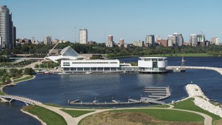 DX0002_149_009 - 5.7K aerial stock footage of Discovery World museum in Downtown Milwaukee, Wisconsin