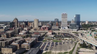 DX0002_149_041 - 5.7K aerial stock footage of flying by the city's skyline and I-794 in Downtown Milwaukee, Wisconsin