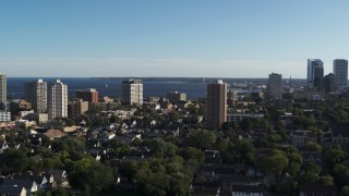 DX0002_150_003 - 5.7K aerial stock footage of a wide view of a high-rise apartment complex in Downtown Milwaukee, Wisconsin
