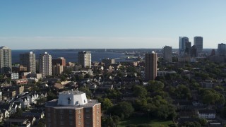DX0002_150_004 - 5.7K aerial stock footage of a wide view of a high-rise apartment complex, reveal Downtown Milwaukee, Wisconsin