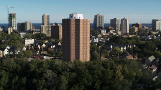 DX0002_150_007 - 5.7K aerial stock footage of circling an apartment complex in Milwaukee, Wisconsin
