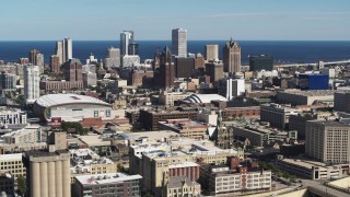 DX0002_152_023 - 5.7K aerial stock footage a view of the city's skyline and arena in Downtown Milwaukee, Wisconsin, seen from I-43 freeway