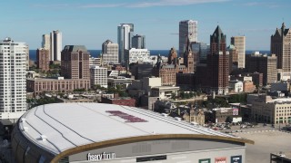 DX0002_152_030 - 5.7K aerial stock footage stationary view of the city's skyline from arena in Downtown Milwaukee, Wisconsin