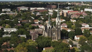 DX0002_152_040 - 5.7K aerial stock footage of circling a church in Milwaukee, Wisconsin