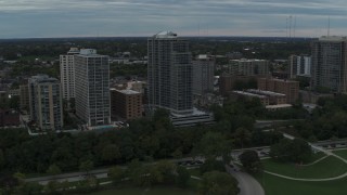 DX0002_154_029 - 5.7K aerial stock footage of passing by a condominium high-rise in Milwaukee, Wisconsin