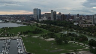 DX0002_154_031 - 5.7K aerial stock footage of a view of the skyline from Veterans Park, Downtown Milwaukee, Wisconsin