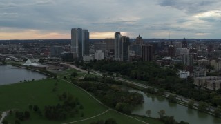 DX0002_154_045 - 5.7K aerial stock footage flyby and away from Veterans Park and skyline of Downtown Milwaukee, Wisconsin