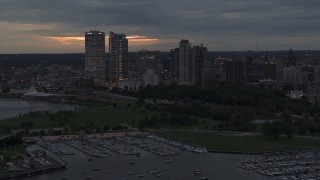 DX0002_155_031 - 5.7K aerial stock footage flyby the marina with a view of the city's skyline at twilight, Downtown Milwaukee, Wisconsin
