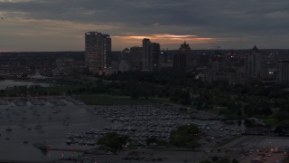 DX0002_155_035 - 5.7K aerial stock footage flyby marina and the city's skyline at twilight, Downtown Milwaukee, Wisconsin