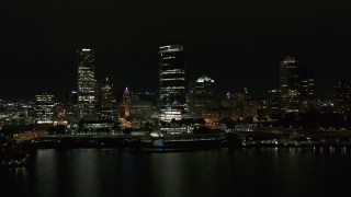 DX0002_157_014 - 5.7K aerial stock footage orbit lakefront museum and skyline at night, Downtown Milwaukee, Wisconsin