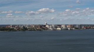 DX0002_158_008 - 5.7K aerial stock footage slowly passing lakefront city buildings in Madison, Wisconsin