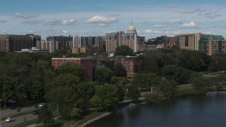 DX0002_158_012 - 5.7K aerial stock footage brick apartment buildings by the water in Madison, Wisconsin