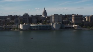 DX0002_160_007 - 5.7K aerial stock footage flyby convention center with capitol and office buildings in background, Madison, Wisconsin