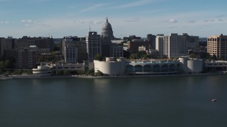 DX0002_160_008 - 5.7K aerial stock footage flyby and approach convention center with capitol and office buildings in background, Madison, Wisconsin