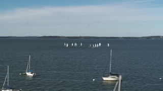DX0002_160_038 - 5.7K aerial stock footage an orbit of a group of sailboats on Lake Mendota, Madison, Wisconsin