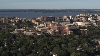 DX0002_161_014 - 5.7K aerial stock footage of a reverse view of a hospital near downtown, Madison, Wisconsin