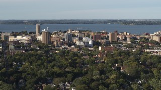 DX0002_161_015 - 5.7K aerial stock footage of orbiting the lakeside university campus, Madison, Wisconsin