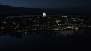 DX0002_162_026 - 5.7K aerial stock footage ascend and orbit capitol dome and convention center at twilight, Madison, Wisconsin