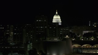 DX0002_162_047 - 5.7K aerial stock footage flyby State Office Building to reveal capital dome at night, Madison, Wisconsin