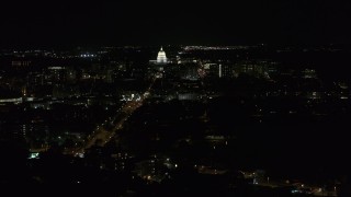 DX0002_163_002 - 5.7K aerial stock footage flyby Washington Avenue while focused on capitol at night, Madison, Wisconsin