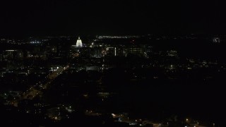 DX0002_163_003 - 5.7K aerial stock footage wide view of capitol at night, reveal Washington Avenue, Madison, Wisconsin