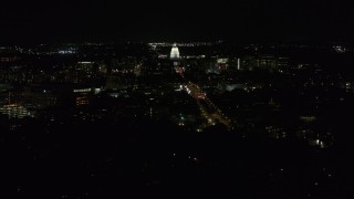 DX0002_163_004 - 5.7K aerial stock footage view of capitol at night while passing Washington Avenue, Madison, Wisconsin