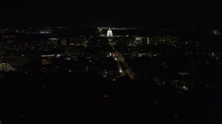 DX0002_163_005 - 5.7K aerial stock footage wide orbit of capitol at night, reveal Washington Avenue, Madison, Wisconsin