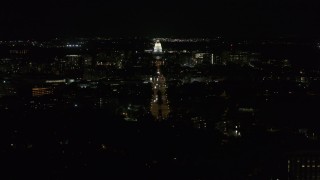 DX0002_163_008 - 5.7K aerial stock footage wide orbit of Wisconsin State Capitol seen from Washington Ave at night, Madison, Wisconsin