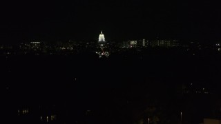 DX0002_163_013 - 5.7K aerial stock footage of a stationary view of the state capitol dome at night, Madison, Wisconsin