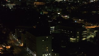 DX0002_163_019 - 5.7K aerial stock footage of a hospital complex at night, Madison, Wisconsin