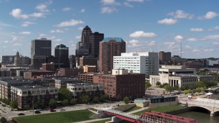 DX0002_165_004 - 5.7K stock footage aerial video the city's skyline seen while passing apartment and office buildings in Downtown Des Moines, Iowa