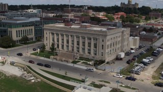 DX0002_165_007 - 5.7K aerial stock footage orbiting front of the Des Moines Police Department building in Des Moines, Iowa