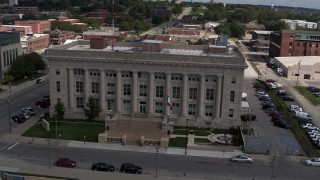 DX0002_165_008 - 5.7K aerial stock footage an orbit of the Des Moines Police Department building in Des Moines, Iowa