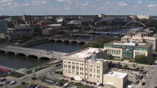 DX0002_165_012 - 5.7K stock footage aerial video approach bridges spanning the river in Des Moines, Iowa