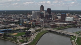 DX0002_165_020 - 5.7K stock footage aerial video a slow approach to the city's skyline across the river, Downtown Des Moines, Iowa