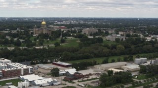 DX0002_165_026 - 5.7K aerial stock footage of a wide view of the Iowa State Capitol and grounds in Des Moines, Iowa