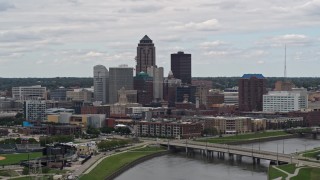 DX0002_165_029 - 5.7K stock footage aerial video of the city's skyline and Cedar River during ascent, Downtown Des Moines, Iowa