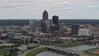 DX0002_165_030 - 5.7K aerial stock footage of the city's skyline seen from the Cedar River, Downtown Des Moines, Iowa