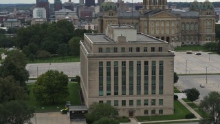 DX0002_166_005 - 5.7K aerial stock footage orbit a state government building on the capitol grounds in Des Moines, Iowa