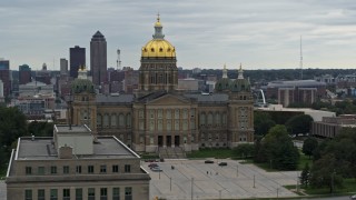 DX0002_166_012 - 5.7K aerial stock footage orbiting the front of the Iowa State Capitol, skyline in the background, Des Moines, Iowa