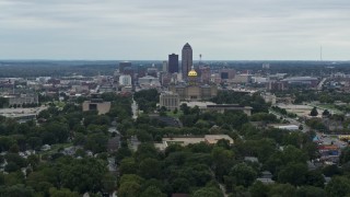 DX0002_166_019 - 5.7K aerial stock footage of ascending with a wide view of the city's skyline and state capitol, Downtown Des Moines, Iowa