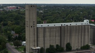 DX0002_166_025 - 5.7K aerial stock footage a reverse view of a grain elevator in Des Moines, Iowa