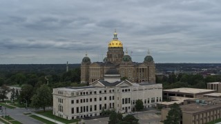 DX0002_166_027 - 5.7K aerial stock footage stationary view of the Iowa State Capitol behind government building, Des Moines, Iowa