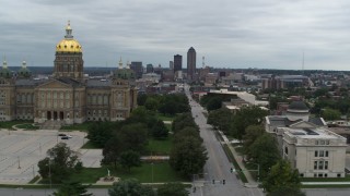 DX0002_166_035 - 5.7K aerial stock footage view of distant skyline, approach state library and pass capitol, Downtown Des Moines, Iowa