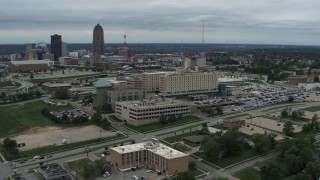 DX0002_166_045 - 5.7K stock footage aerial video orbit and fly away from a hospital in Des Moines, Iowa