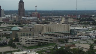 DX0002_167_007 - 5.7K stock footage aerial video reverse view of a hospital in Des Moines, Iowa