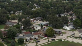 DX0002_169_007 - 5.7K aerial stock footage of suburban homes and streets in Council Bluffs, Iowa