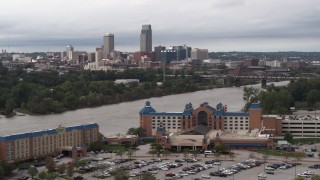 DX0002_170_002 - 5.7K aerial stock footage of the city's skyline seen from the other side of the Missouri River, Downtown Omaha, Nebraska