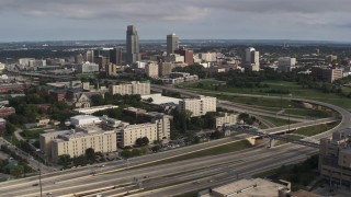 DX0002_170_015 - 5.7K aerial stock footage view of the city's skyline seen from university and North Freeway, Downtown Omaha, Nebraska