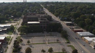 DX0002_170_016 - 5.7K aerial stock footage view of Omaha Adult High School and Cuming Street in Omaha, Nebraska